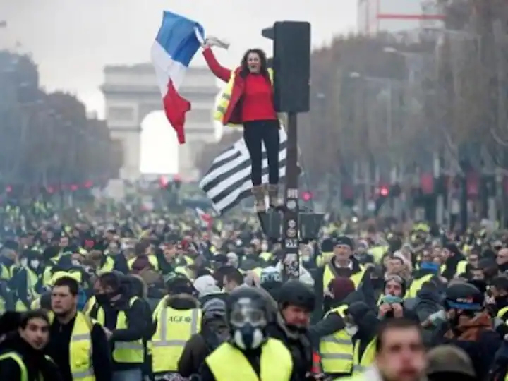 Burnt out cars and shattered glass on Paris streets after protests turn to riots and looting